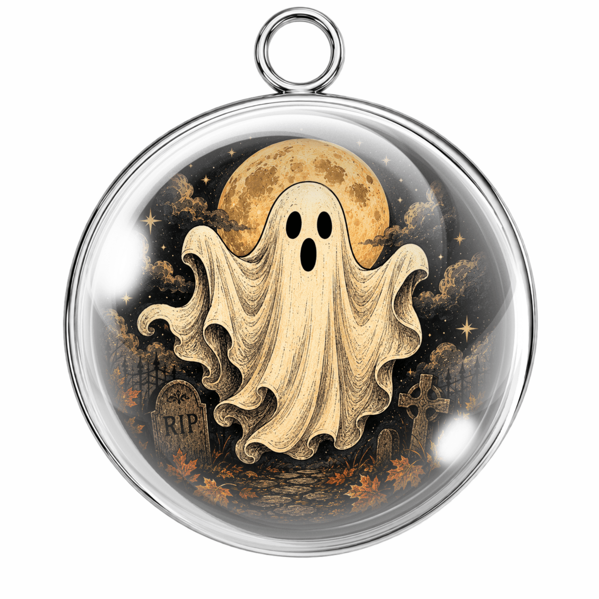 A round glass pendant with a silver-toned metal rim and hanging loop, featuring a ghostly illustration with a cream-colored floating ghost, a yellow moon, tombstones, and a dark starry background.