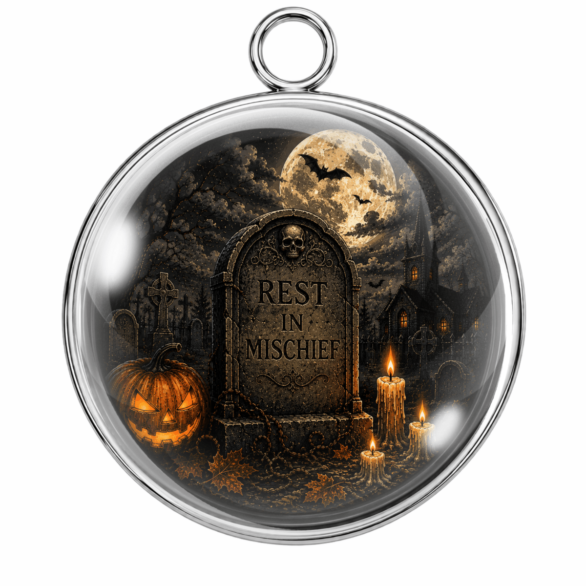 Round silver-toned glass pendant with a hanging loop, featuring a Halloween night scene printed inside: a tombstone reading 'REST IN MISHCHIEF,' a carved pumpkin, candles, bats, and a full moon on a white background.