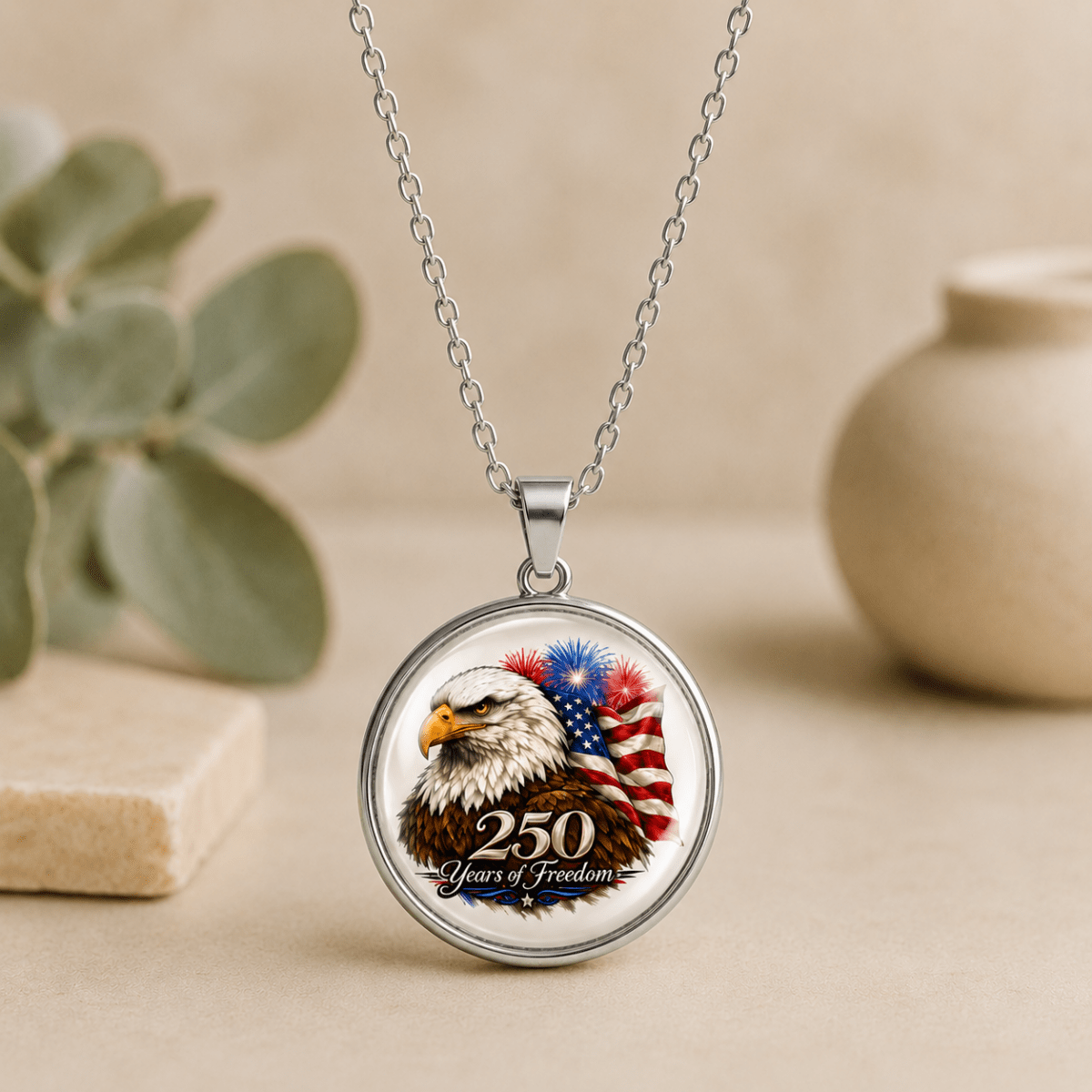 Necklace with a pendant featuring an eagle and American flag design on a beige background.