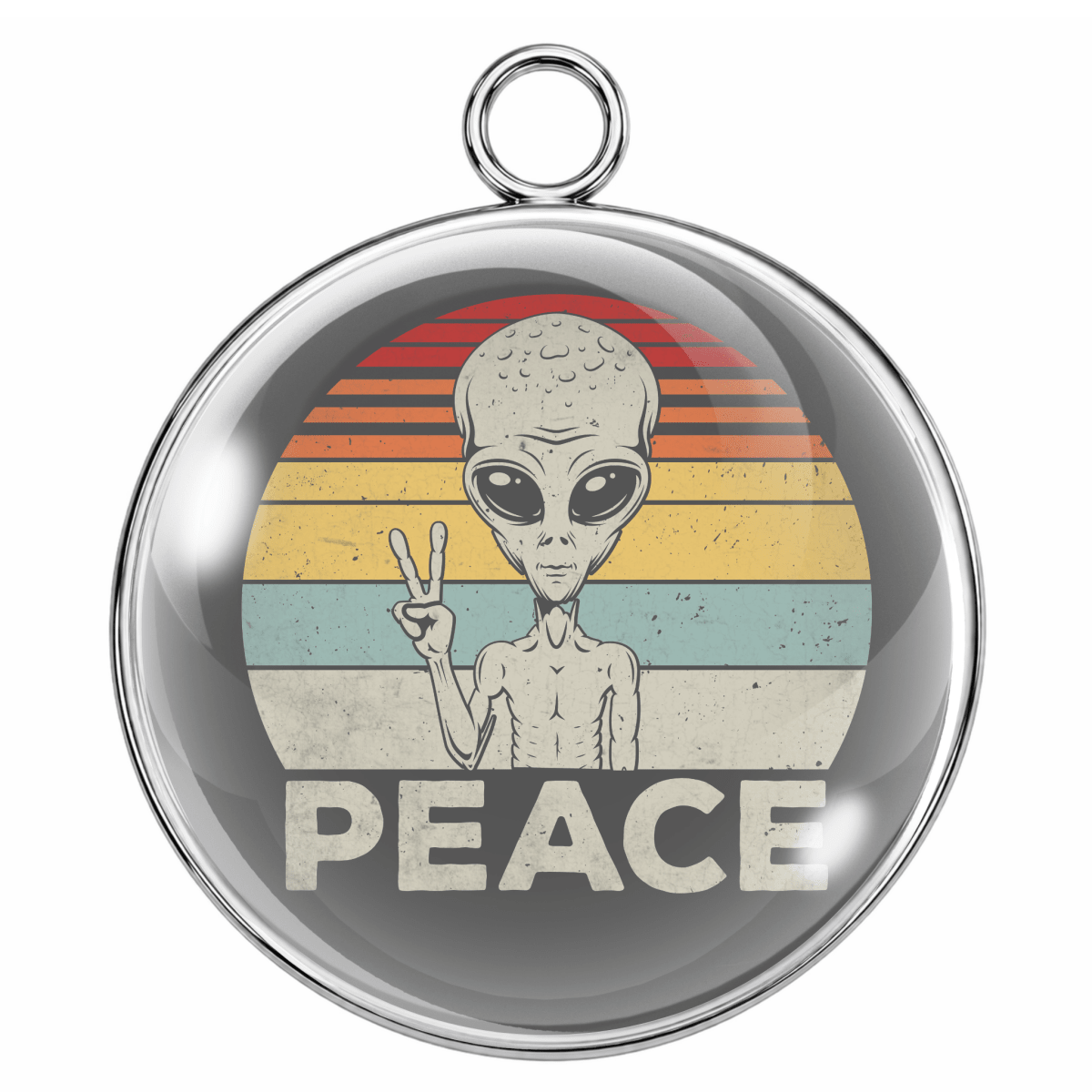 Circular pendant with alien design and 'PEACE' text on a colorful background