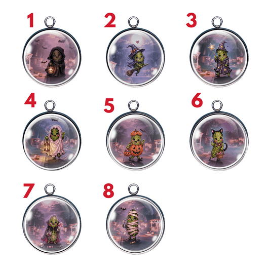 Pickle Halloween glass cabochon charm collection featuring eight whimsical pickle characters dressed in fun Halloween costumes.