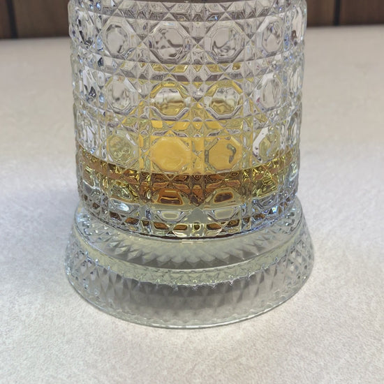 video of spinning whiskey glass