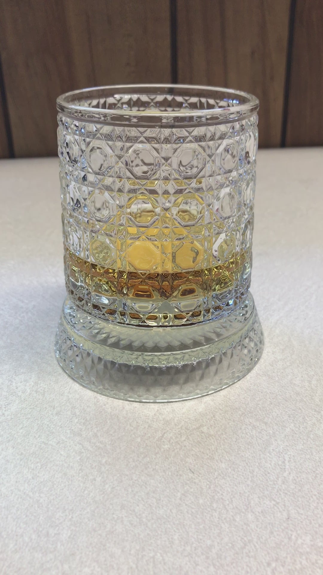 video of spinning whiskey glass