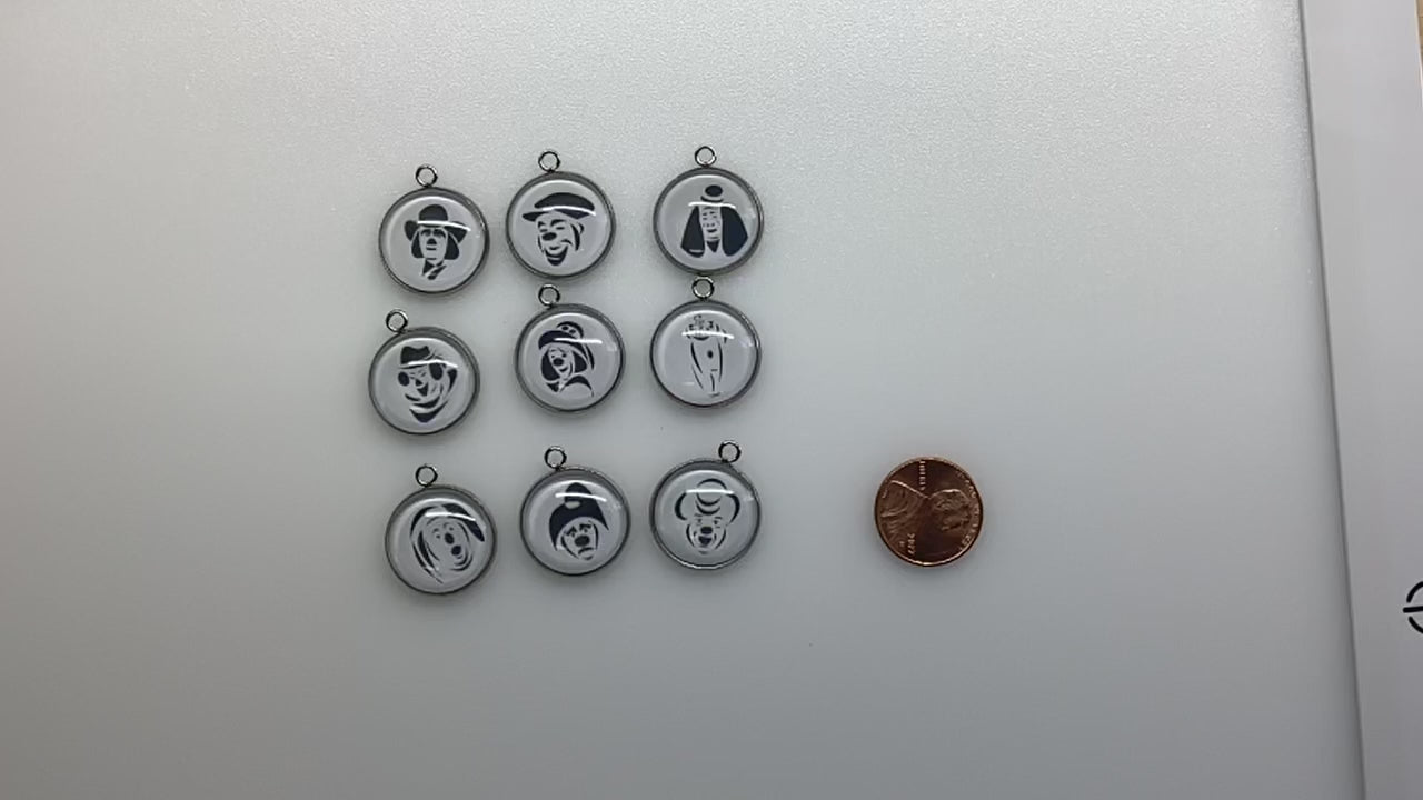 Video showing all 9 charms with a penny for size reference