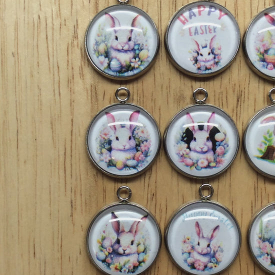 video of 9 Easter Bunny glass cabochon charms