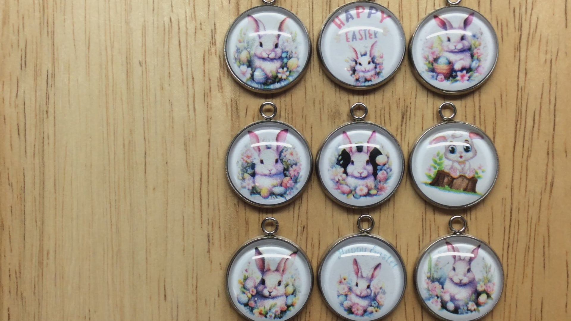 video of 9 Easter Bunny glass cabochon charms