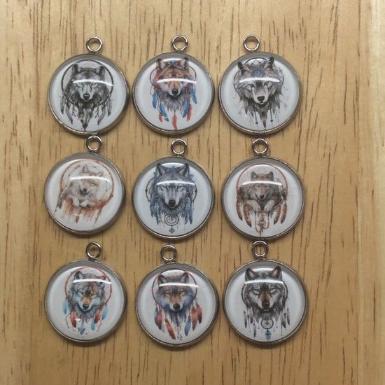 video of 9 boho wolf dreamcatcher glass cabochon charms