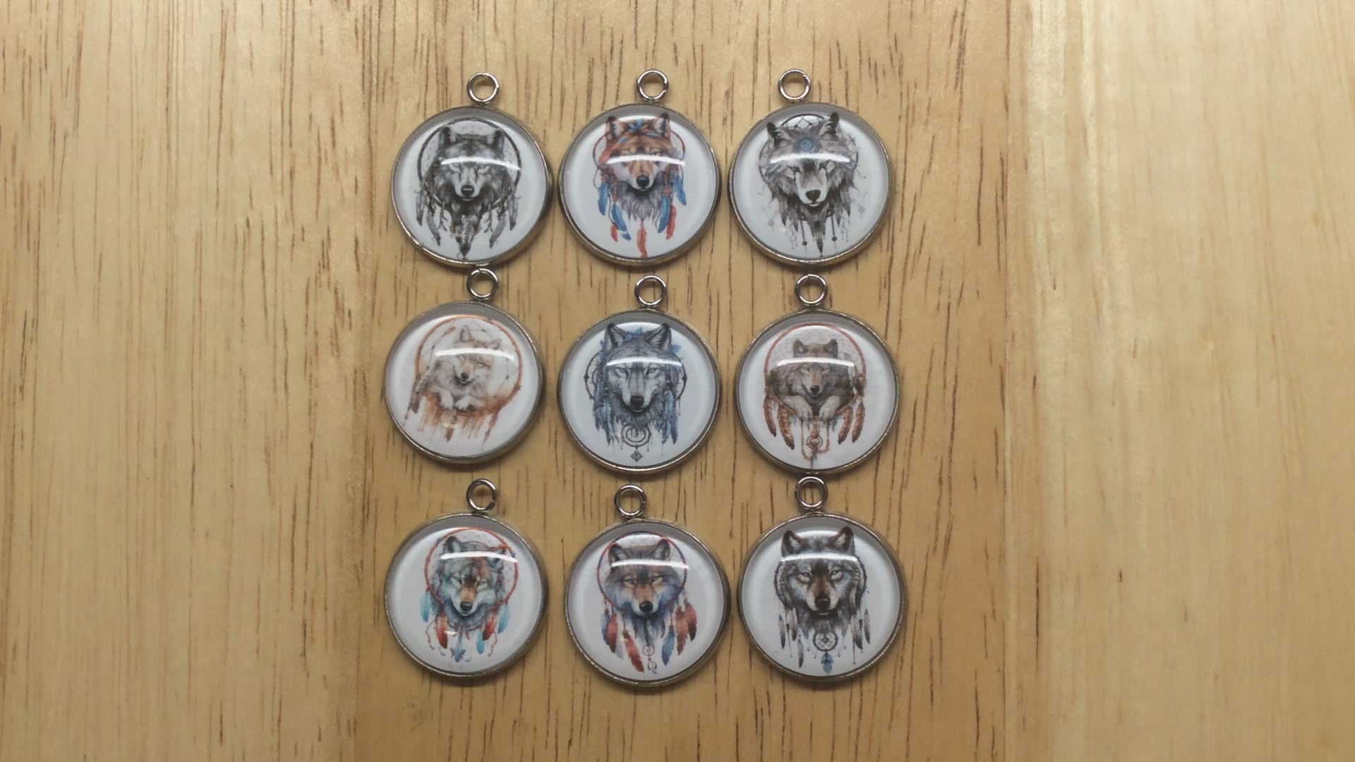 video of 9 boho wolf dreamcatcher glass cabochon charms