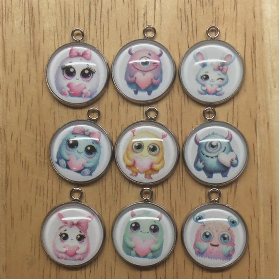 video of 9 cute monster valentine glass cabochon charms