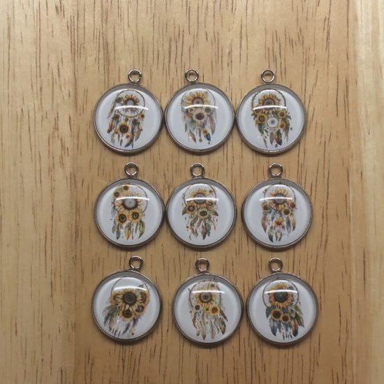 video of 9  sunflower dreamcatcher glass cabochon charms