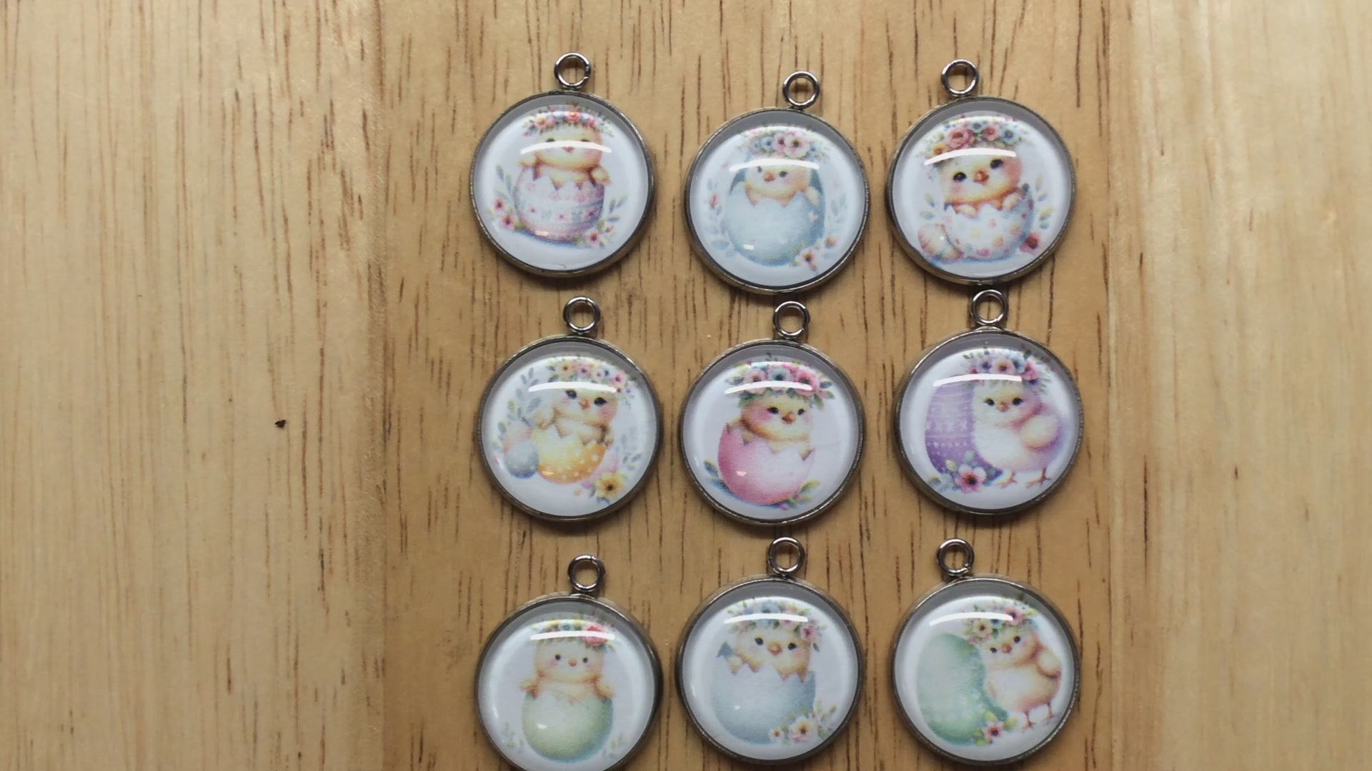 video of9 glass cabochon charms with baby chicks inside