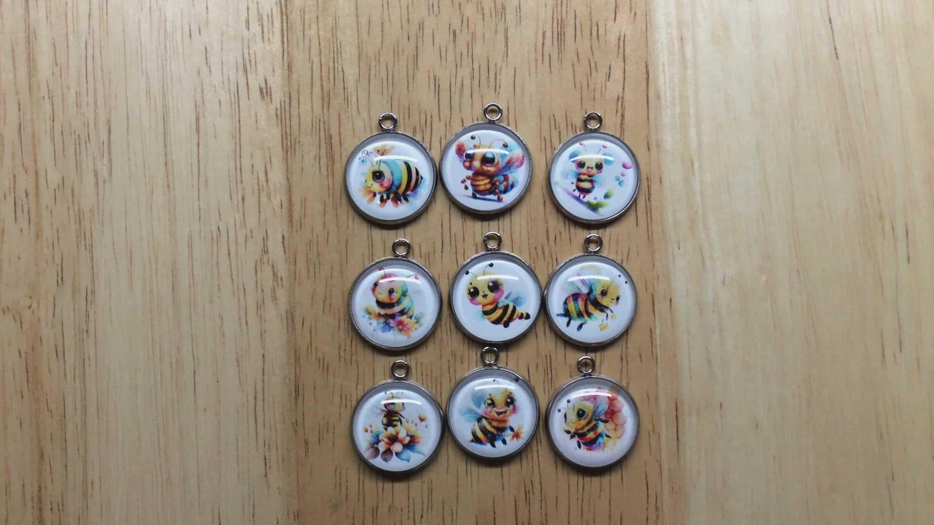 video of glass cabochon charms with a cute bumble bee images