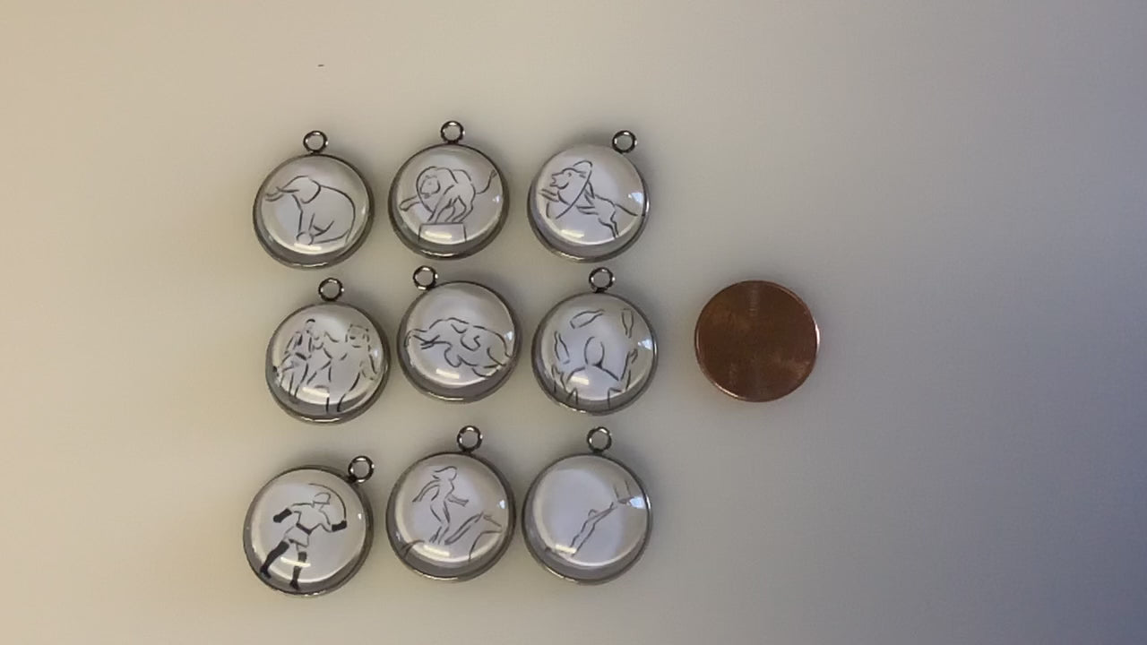 video of the 9 charms with a penny for size reference