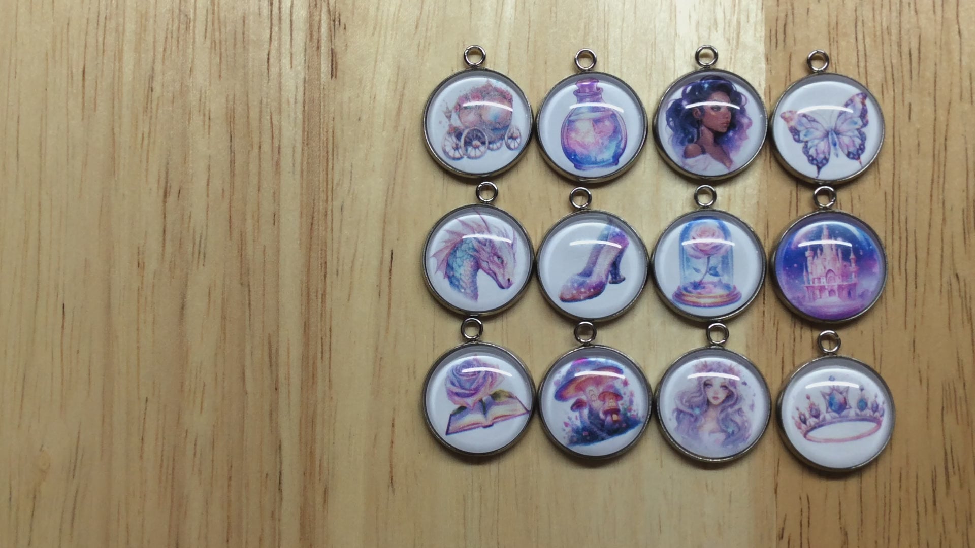 video of 12 fairytale themed glass cabochon charms