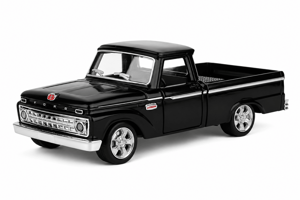 A black die-cast model of a classic Ford pickup truck, shown from a three-quarter front angle on a clean white background.