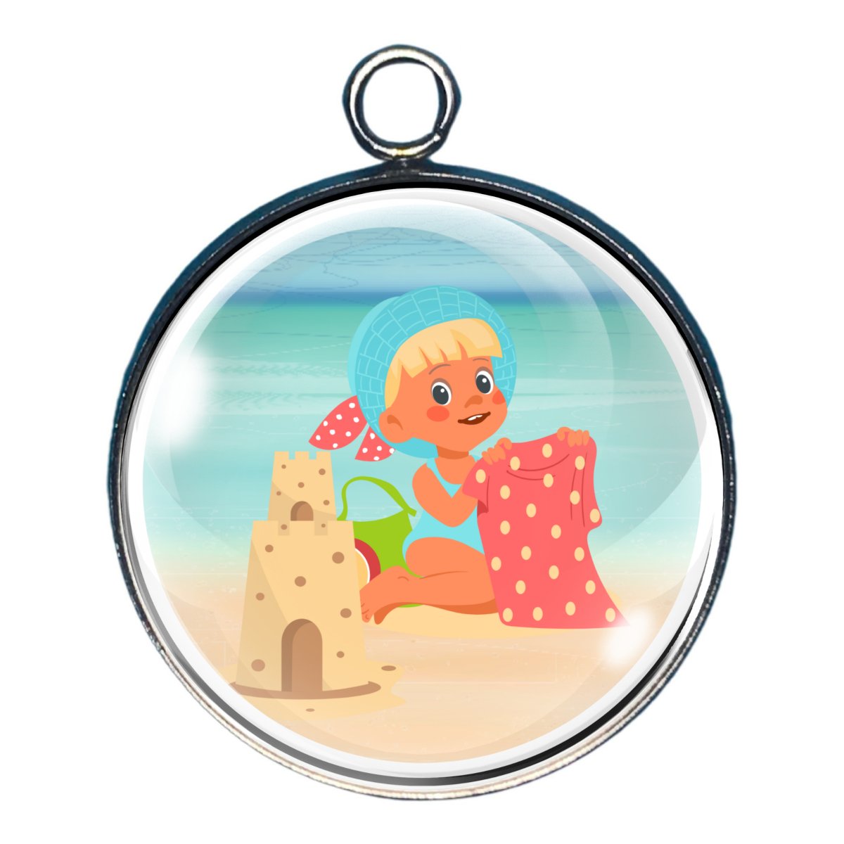 charm depicting a child at the beach with a shirt and a sandcastle