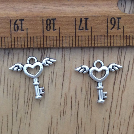 2 tibetan silver angel wing key charms