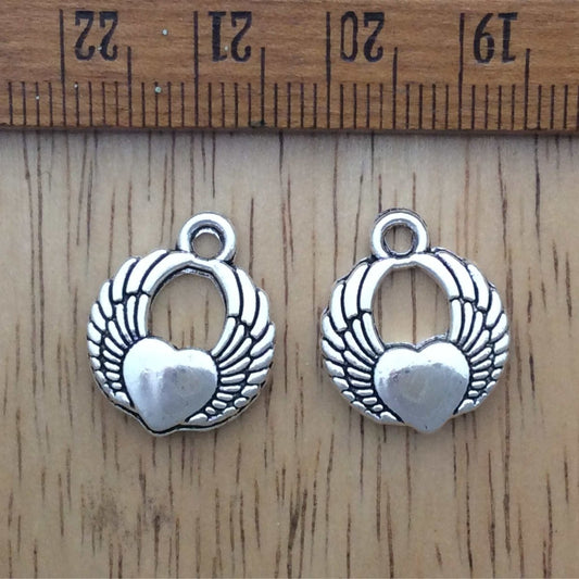 2 tibetan silver hearts with angel wings charms