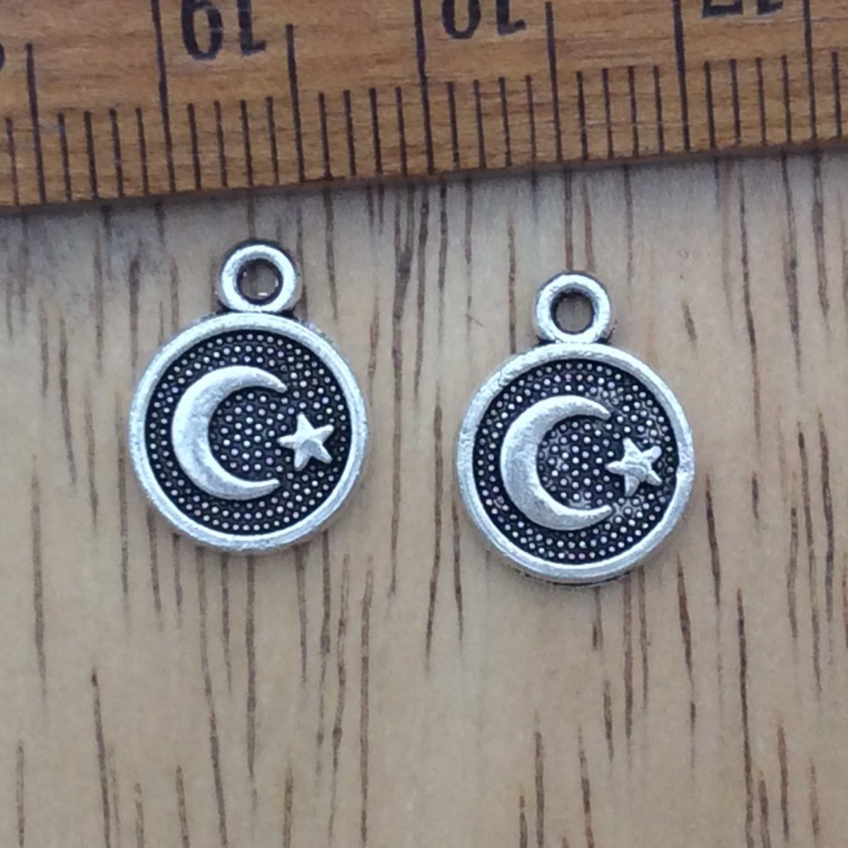 2 tibetan silver round Moon star charms