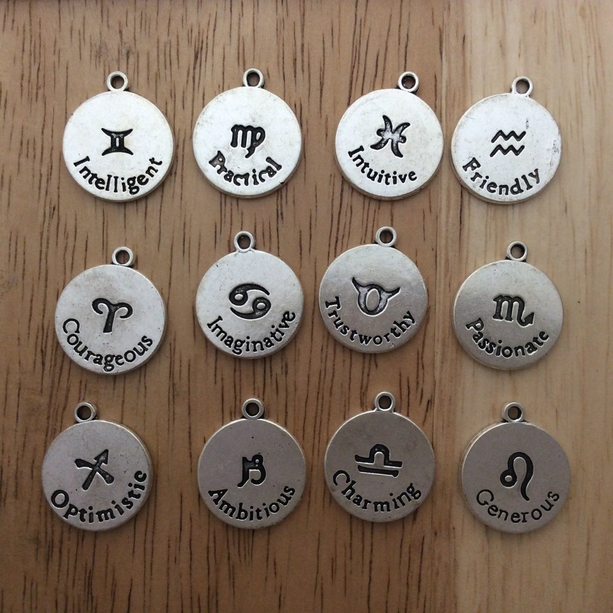 12 zinc alloy zodiac charms