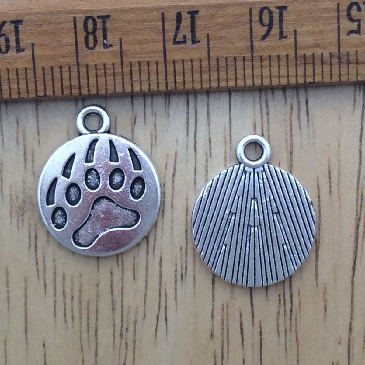 2 tibetan silver bear claw charms