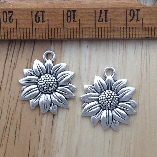 2 tibetan silver sunflower charms