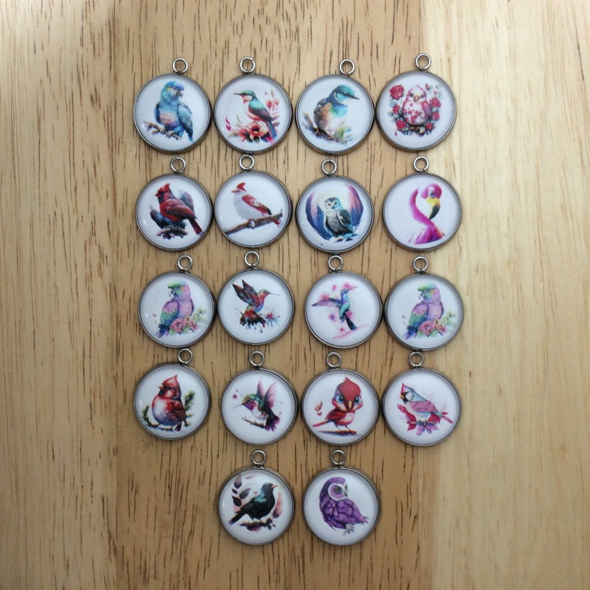 18 glass cabochon charms with different colorful birds