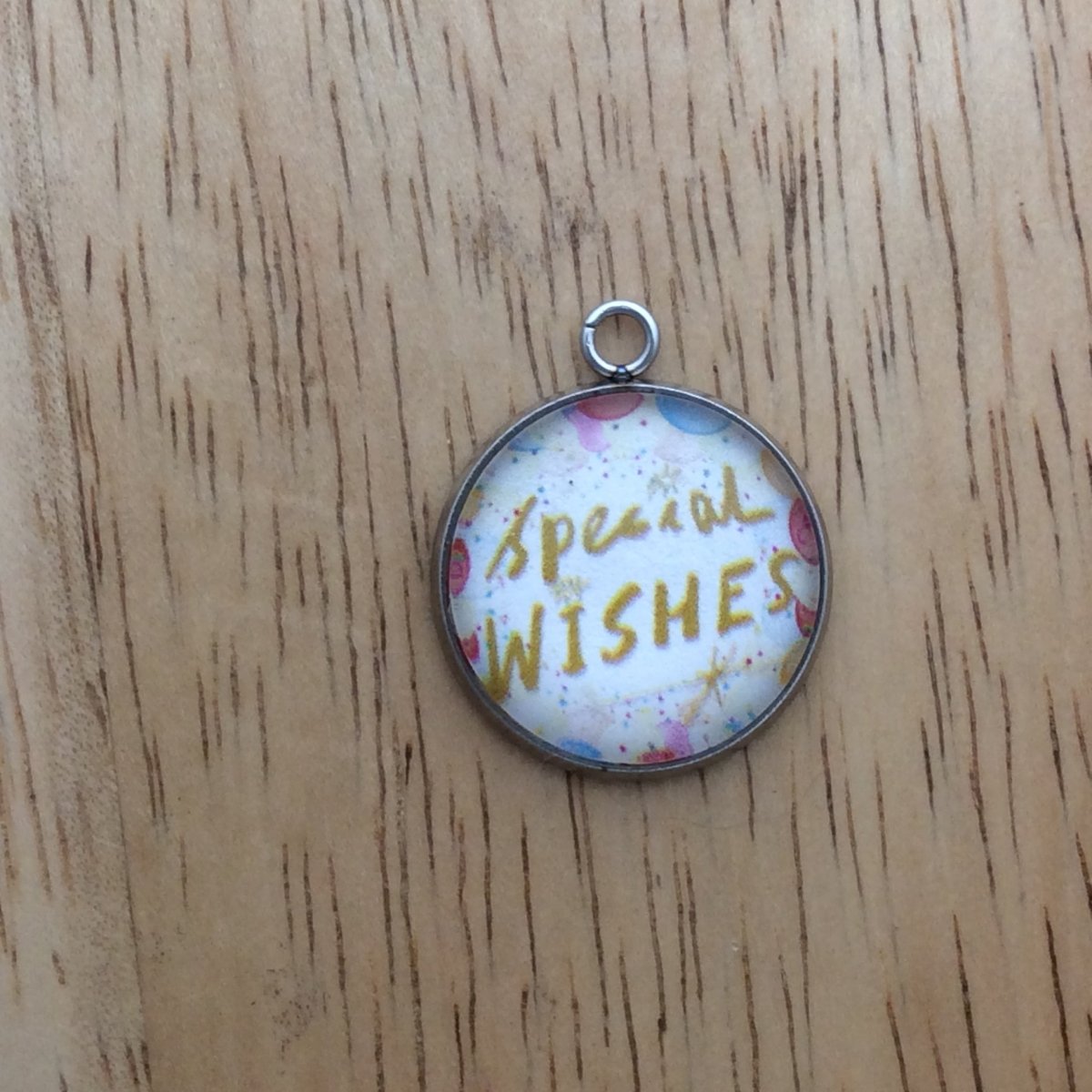 glass cabochon charm with balloons and says special wishes