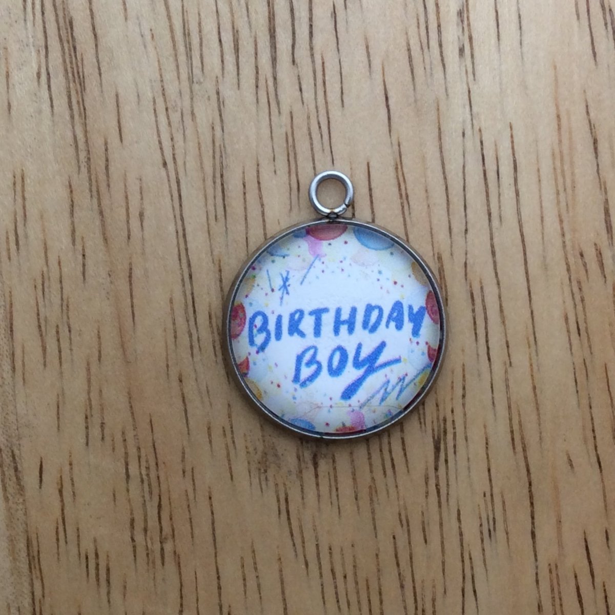 glass cabochon charm with balloons and says birthday boy