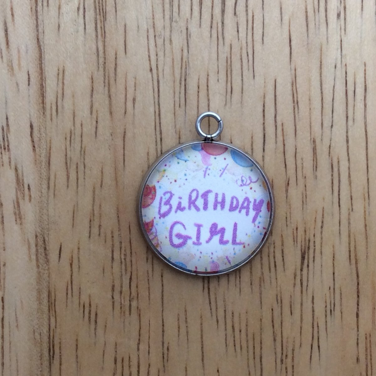 glass cabochon charm with balloons and says birthday girl