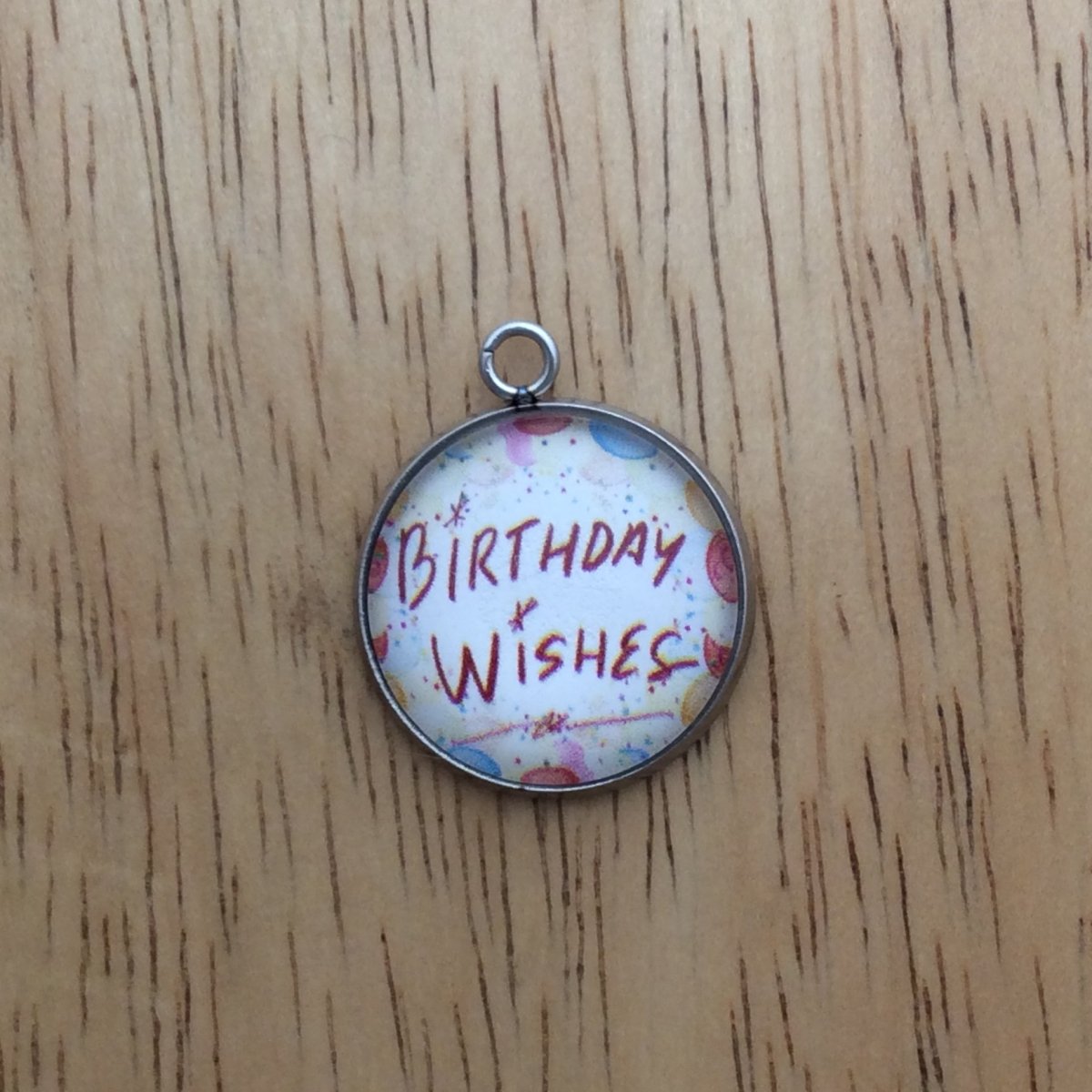 glass cabochon charm with balloons and says birthday wishes