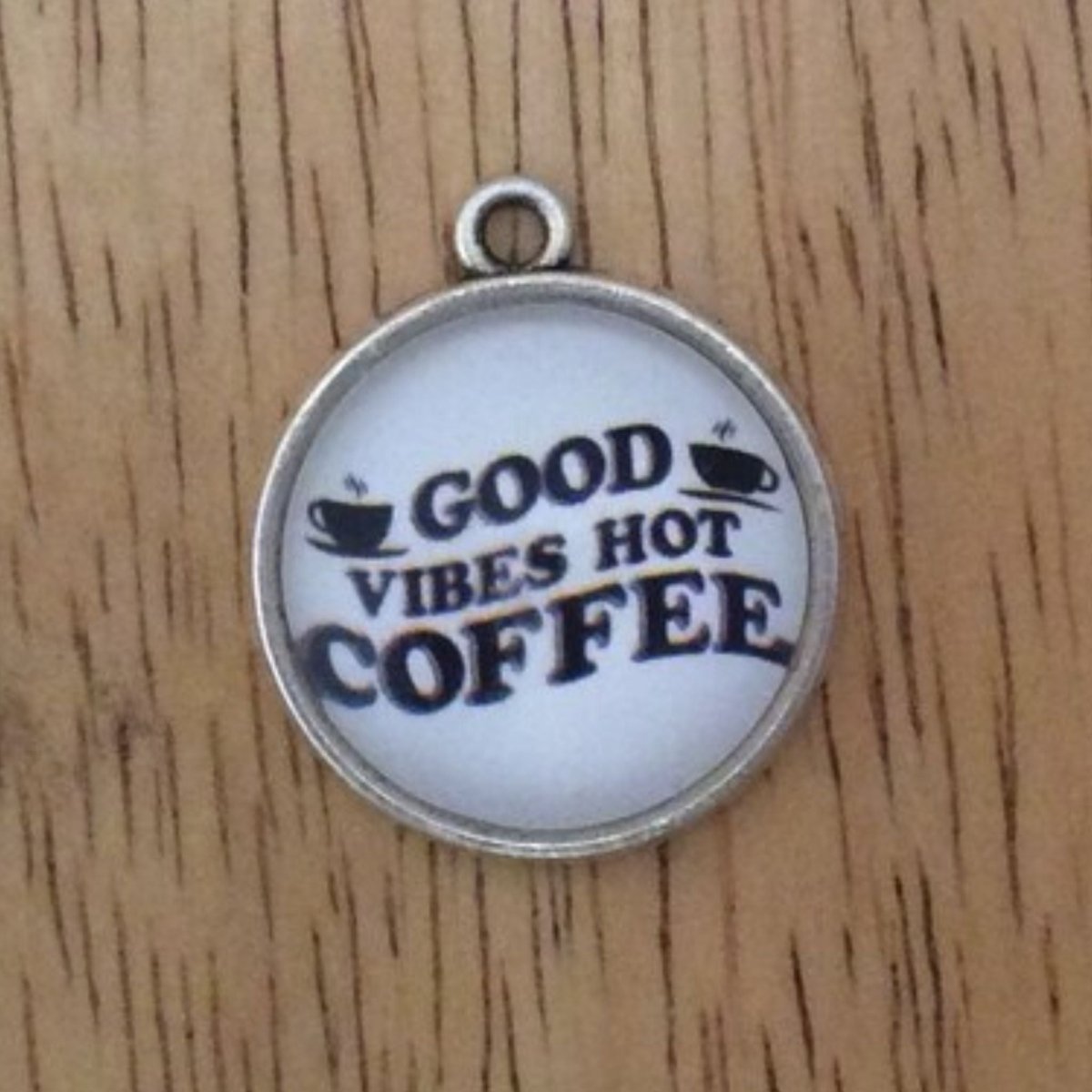 glass cabochon charm that says good vibes hot coffee with two coffee cups