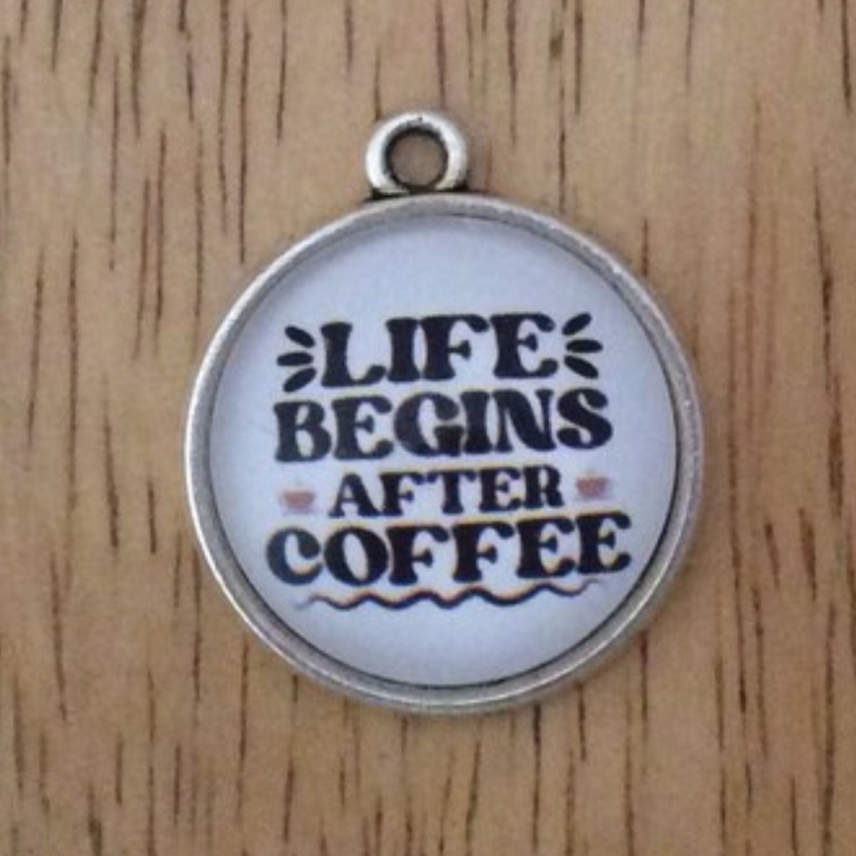 glass cabochon charm that says Life begins after coffee