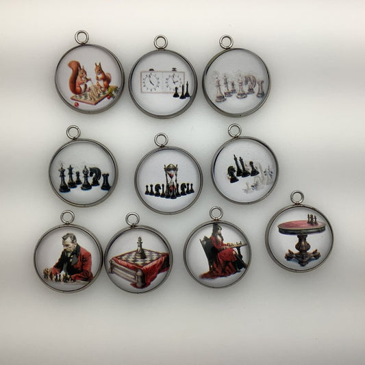 group of 10 charms depicting chess