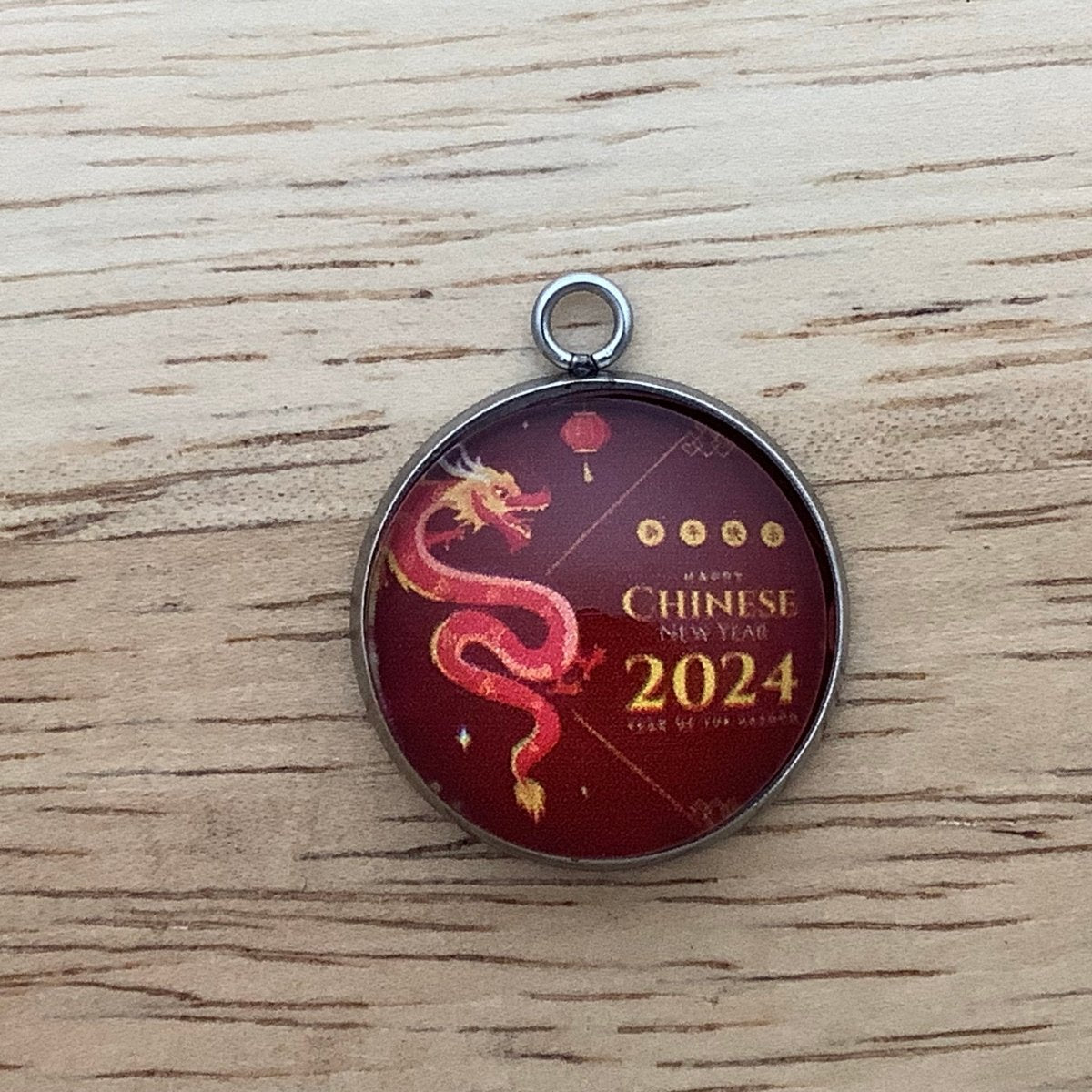 slinky dragon with Chinese new year 2024 written on it