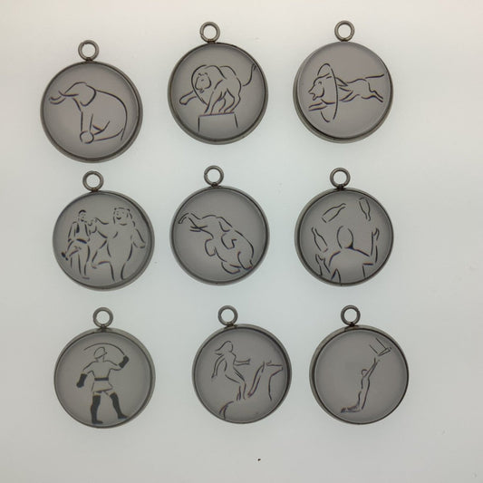 group of 9 charms - line art drawings in the circus theme