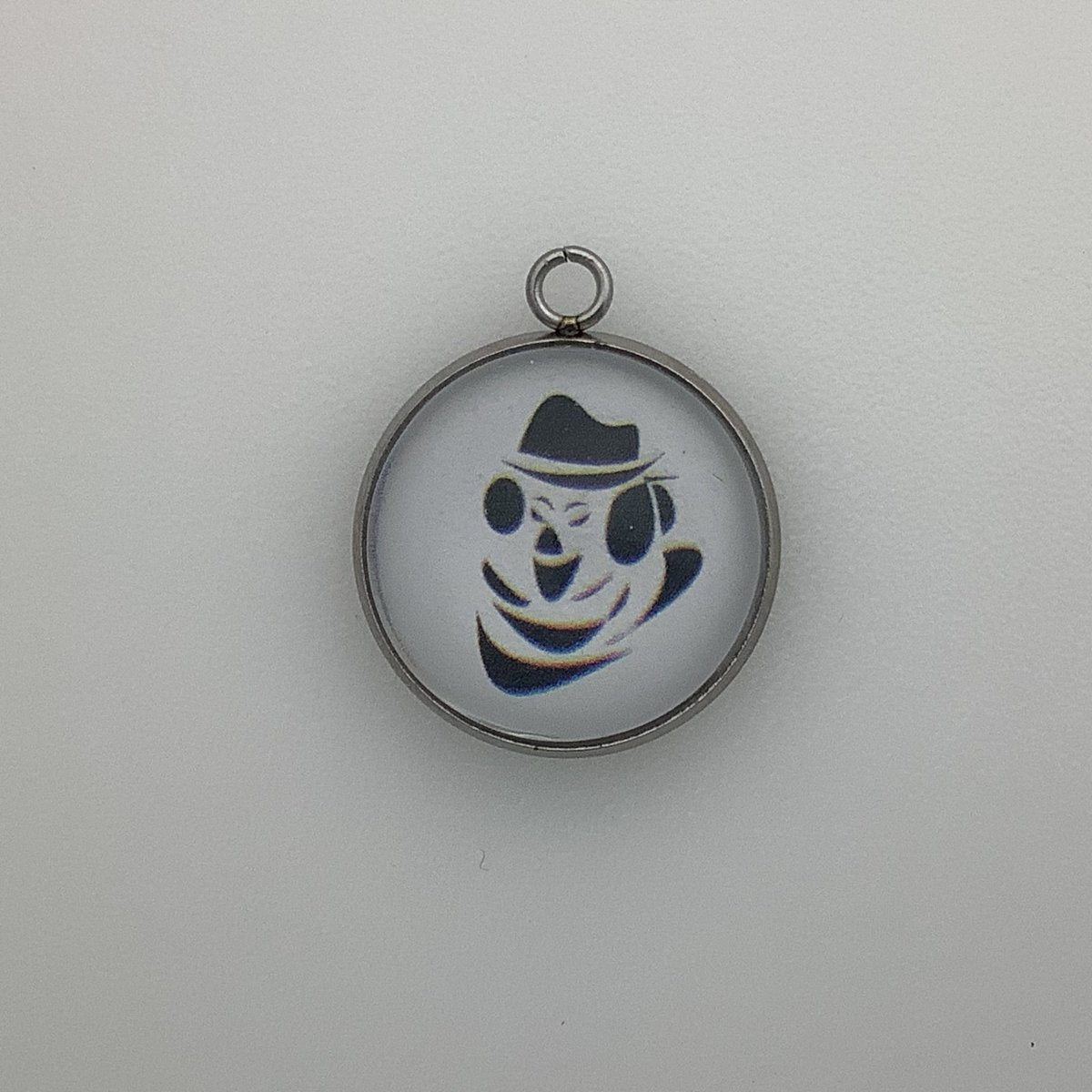 a clown wearing a fedora and a big smile