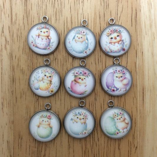 9 glass cabochon charms with baby chicks inside