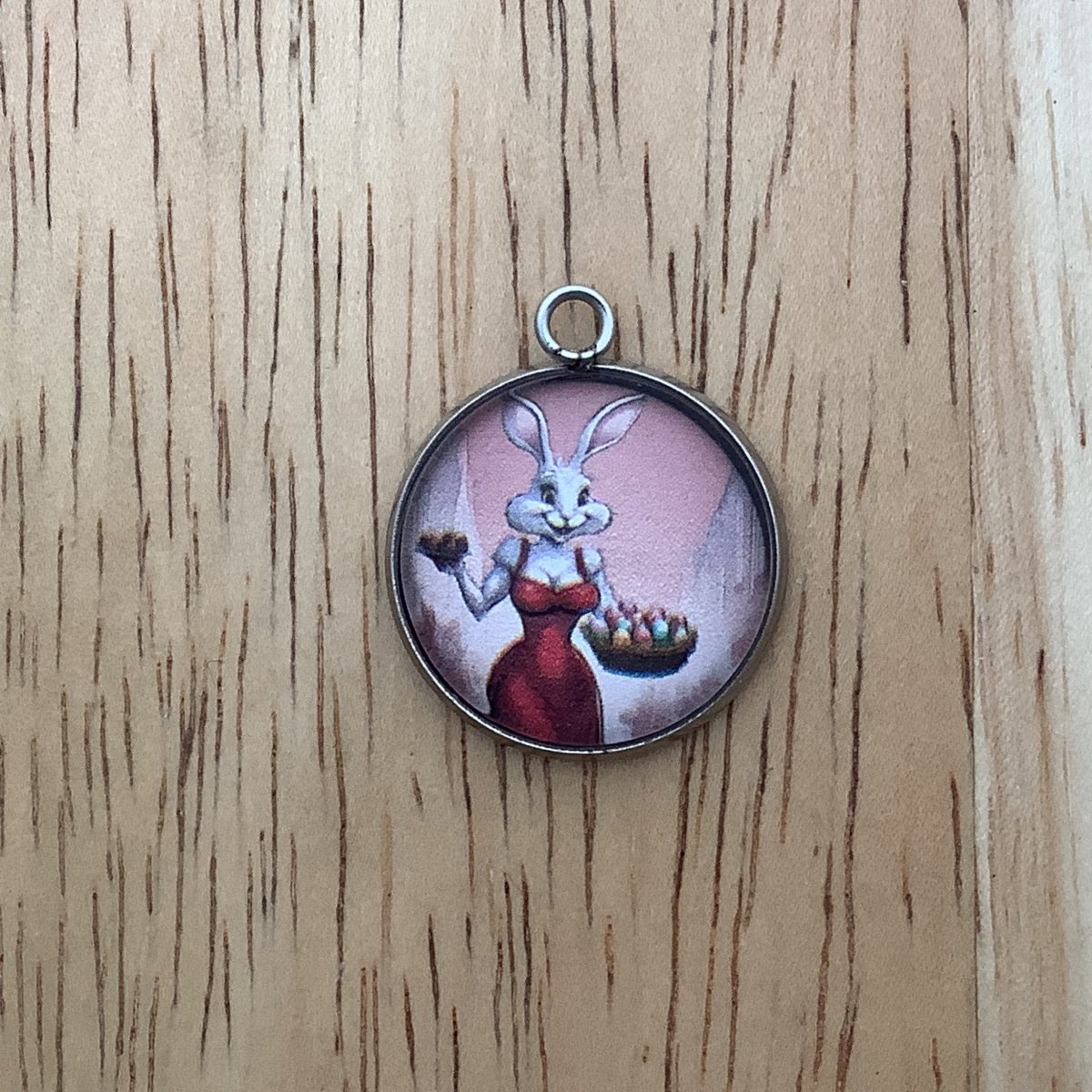 female easter bunny wearing a red dress carrying a basket of eggs to deliver