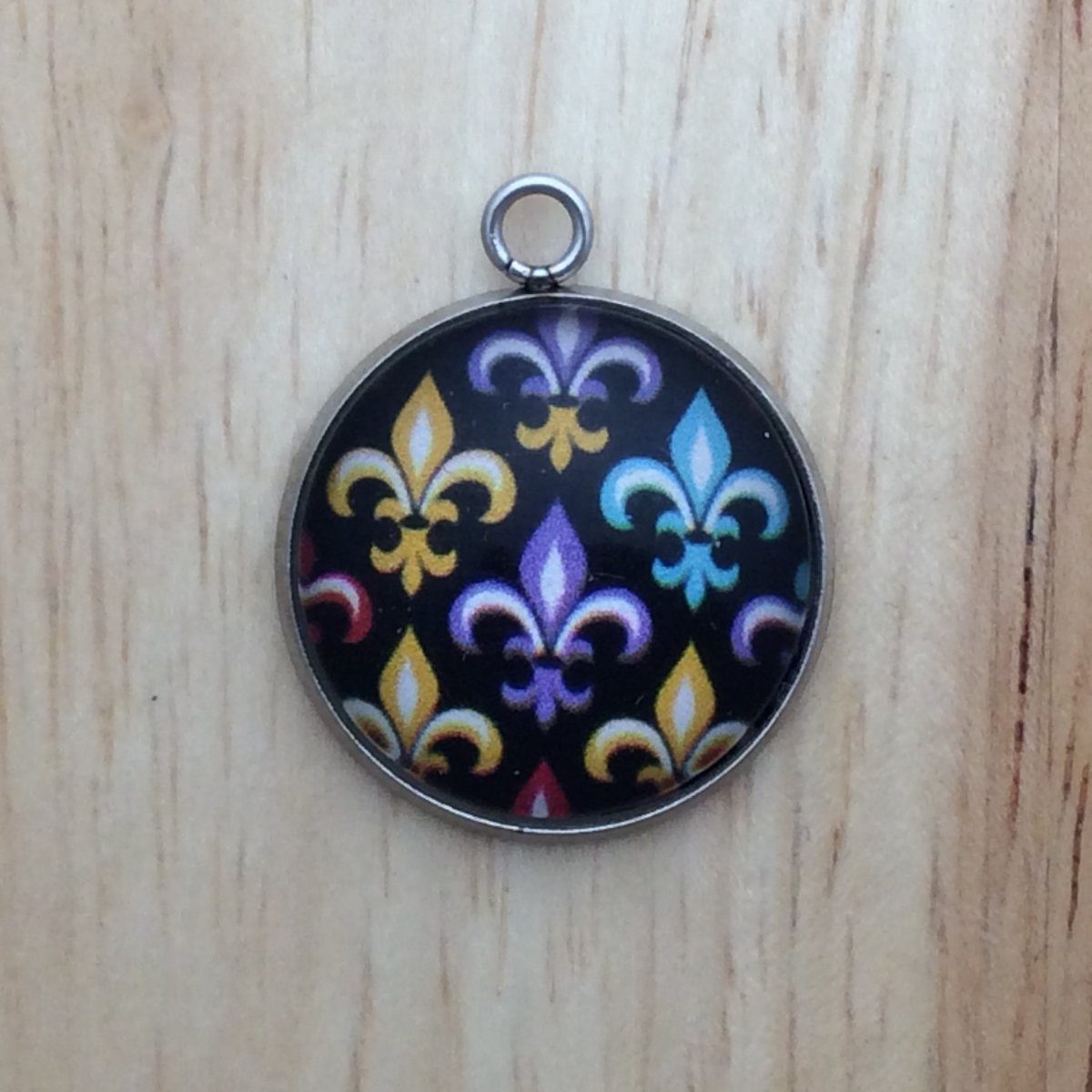 Fleur de lis mardi gras themed glass cabochon charm