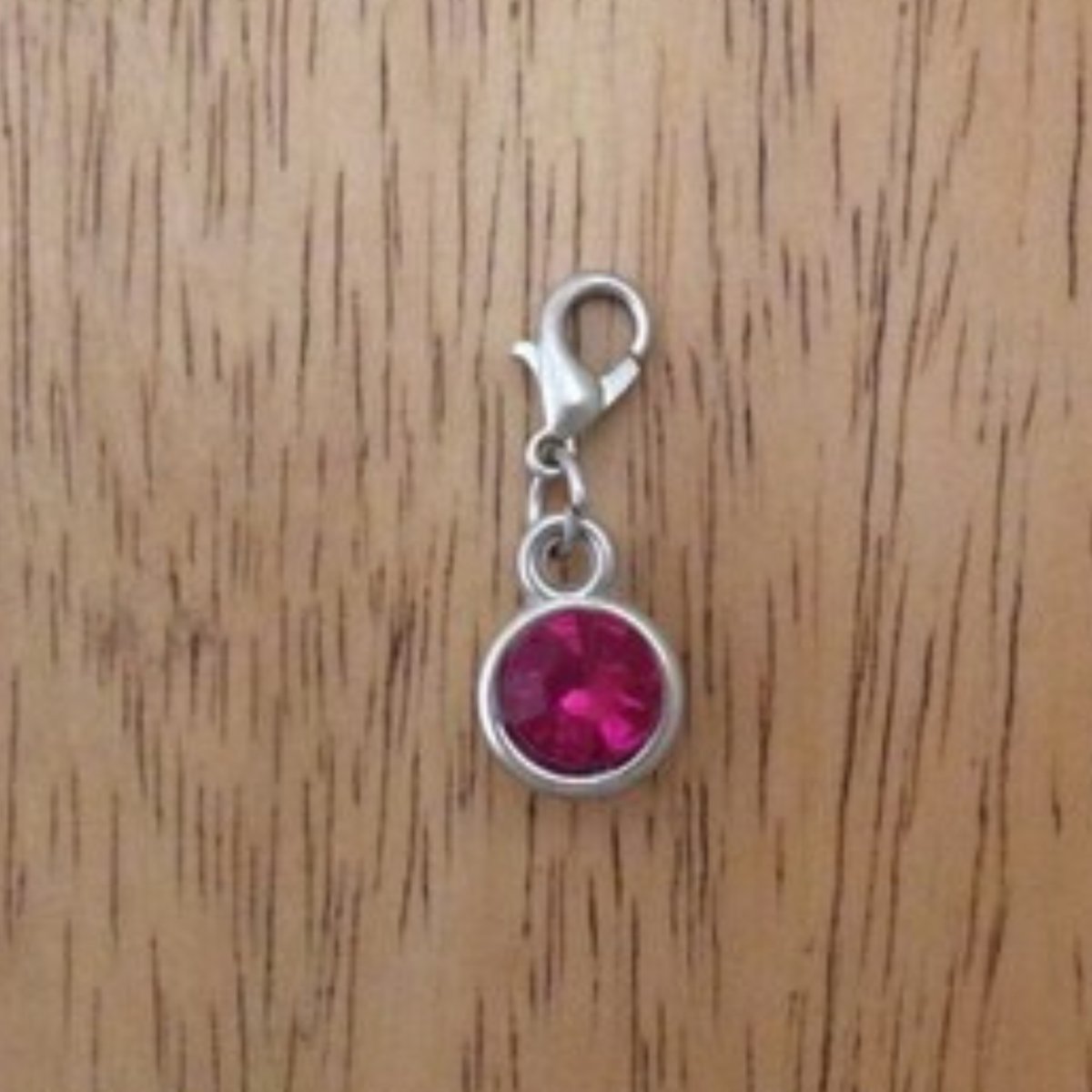 Dark Pink gemstone charms with a lobster clasp