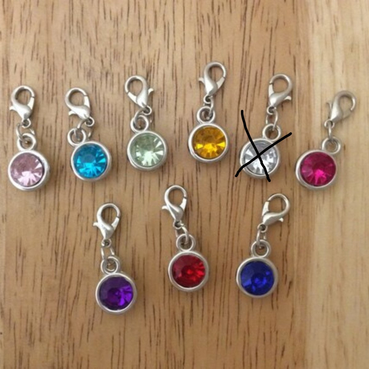 9 gemstone charms with a lobster clasp