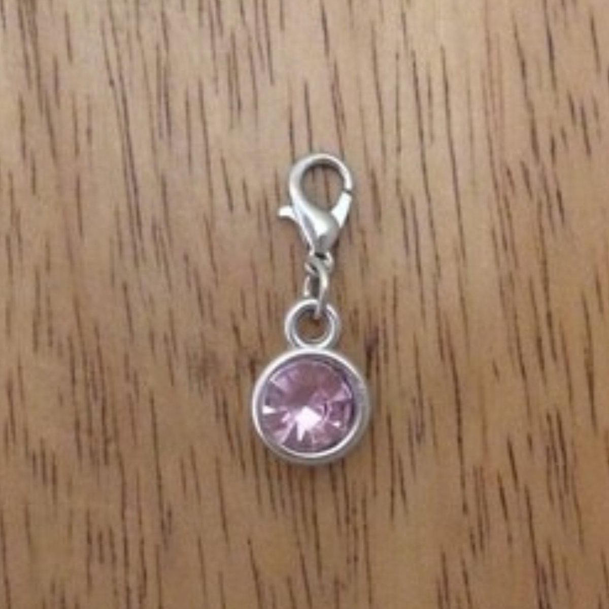 pink gemstone charms with a lobster clasp