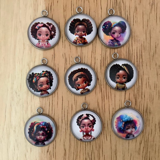 group of 9 charms depicting young black girls