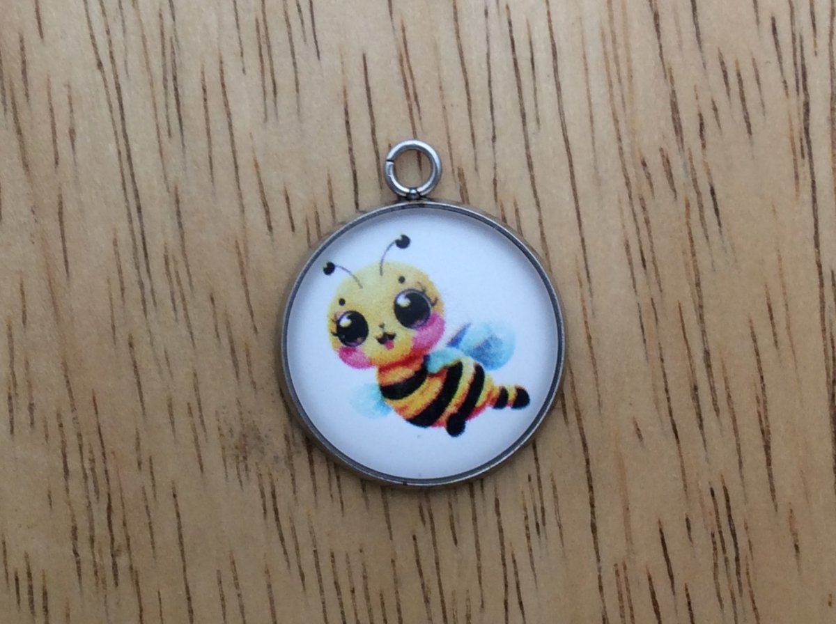 glass cabochon charm with a cute bumble bee image