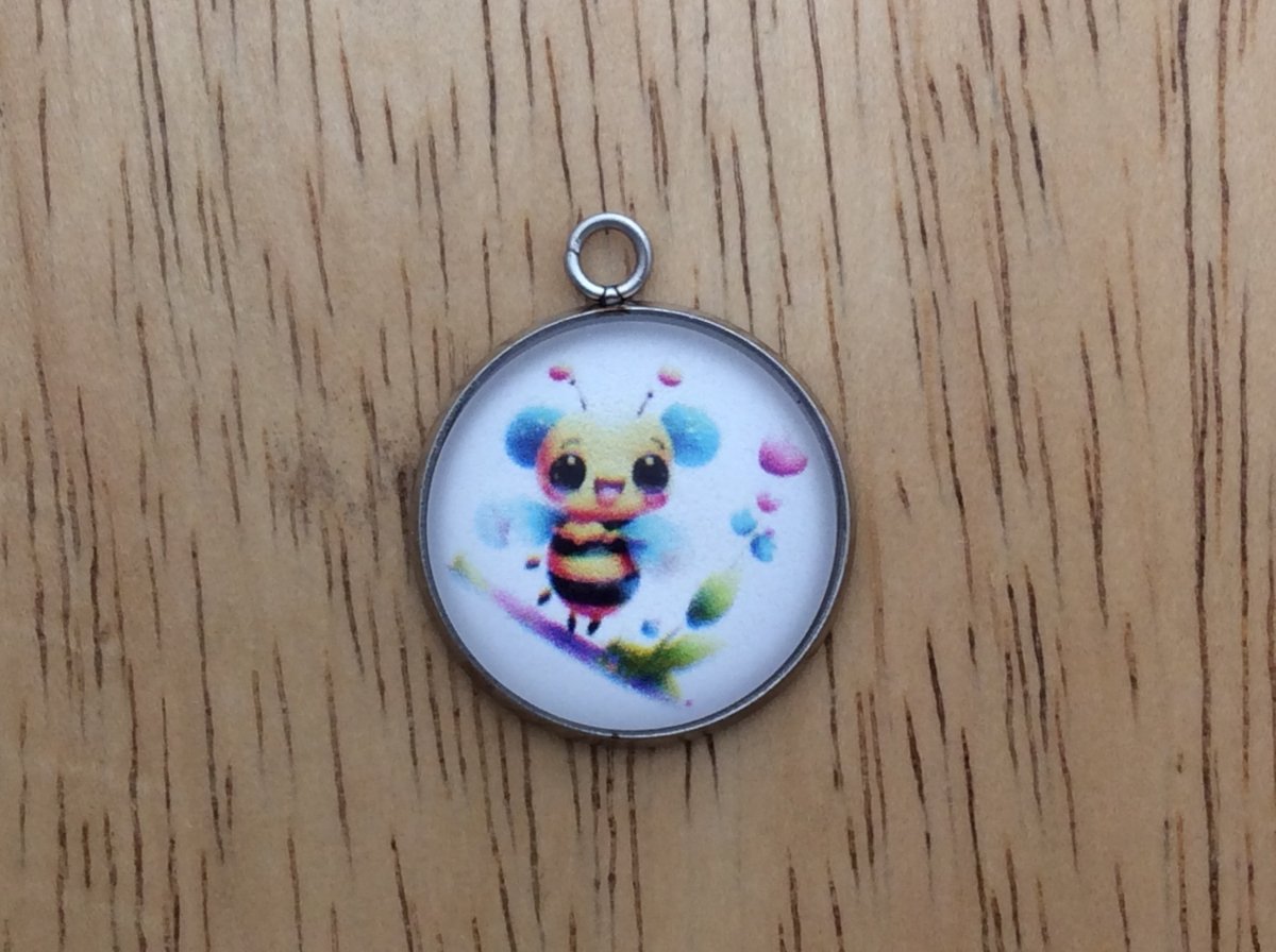 glass cabochon charm with a cute bumble bee image