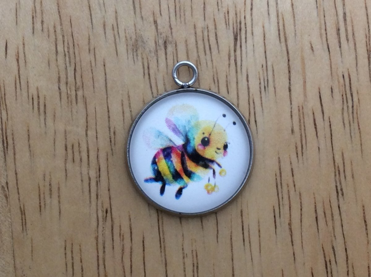 glass cabochon charm with a cute bumble bee image