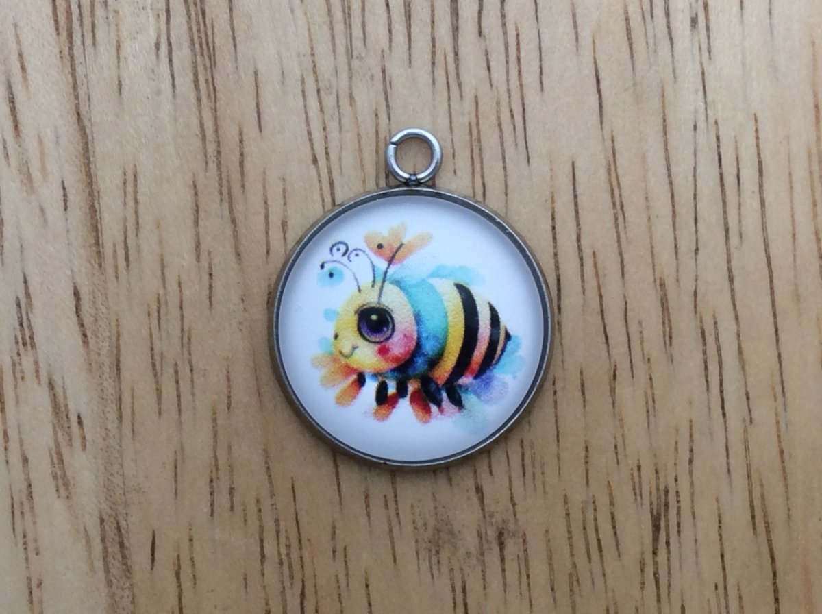 glass cabochon charm with a cute bumble bee image