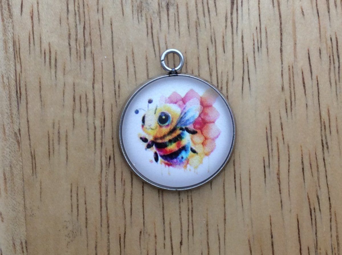 glass cabochon charm with a cute bumble bee image