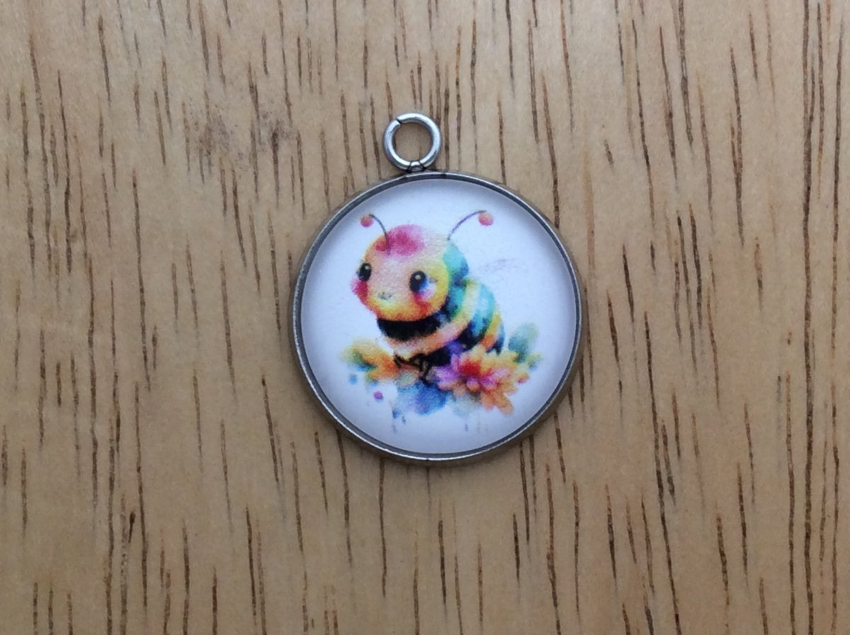 glass cabochon charm with a cute bumble bee image